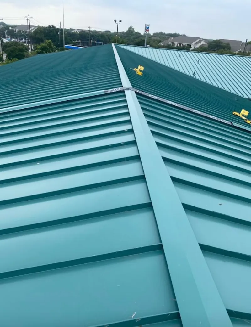 Green commercial metal roof ridge and valley for Metal Roof Repair in Beavercreek