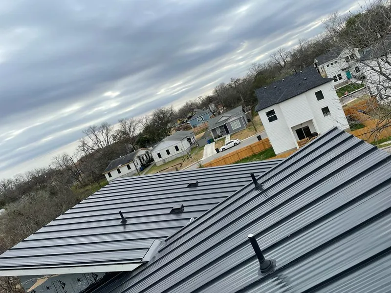 Standing seam metal roof panels with vents for Skylight Repair in Beavercreek
